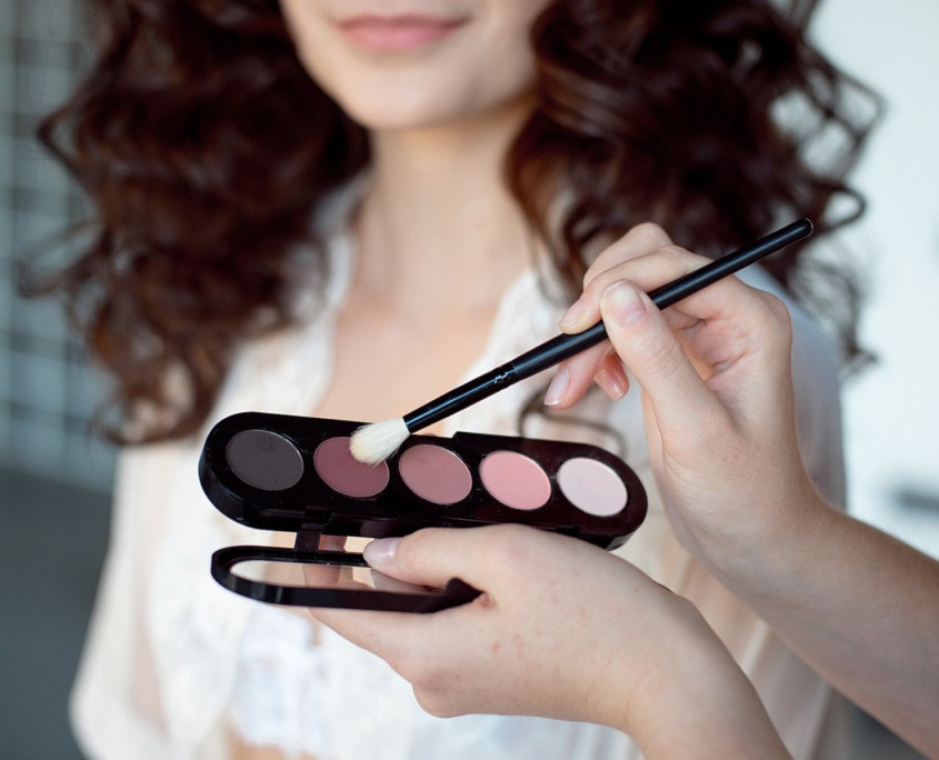 Make Up Artist Applying Make Up to Actress